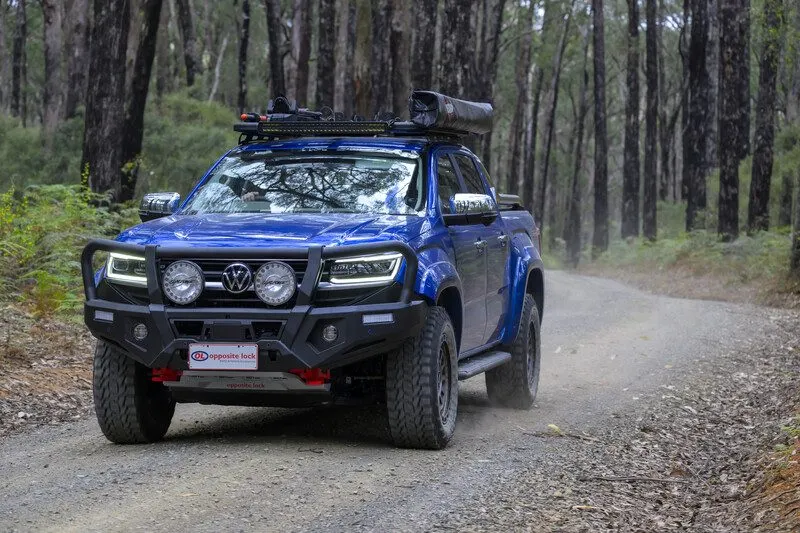 Volkswagen Amarok with Opposite Lock bull bar on a forest track