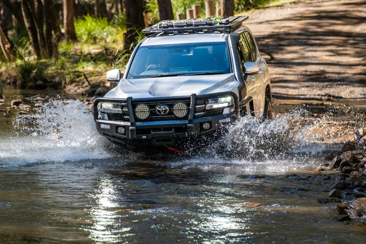 Toyota LandCruiser 300 with an Opposite Lock bull bar in a water crossing