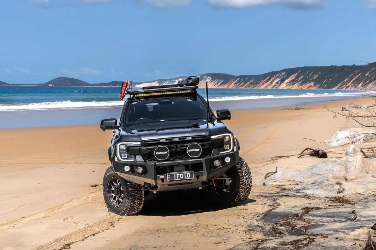Ford Ranger with a Raxar bull bar and roof rack on a Queensland beach