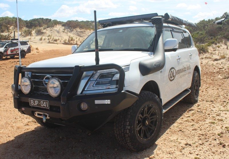 Nissan Patrol Y62 with Opposite Lock bull bar on sand