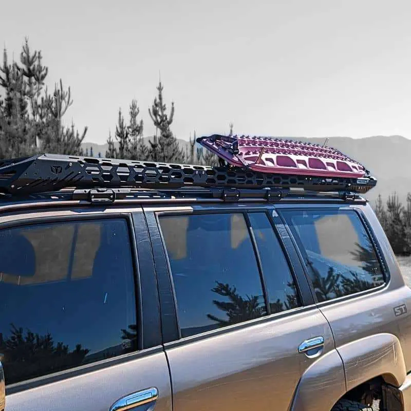 TrailMax recovery board mounting kit on a roof rack